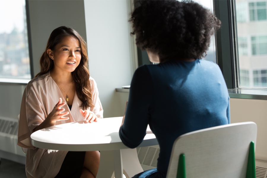 Employees talking together to make sure they have a plan