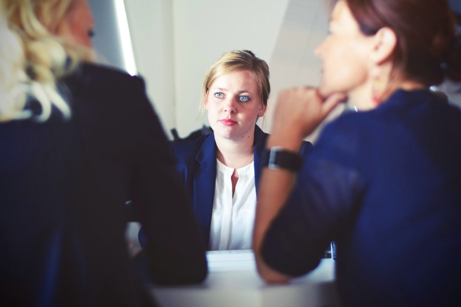 three women in an HR meeting